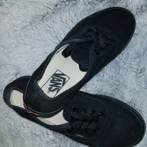Black laces up Vans. Size Men's 5.5 & women's 7